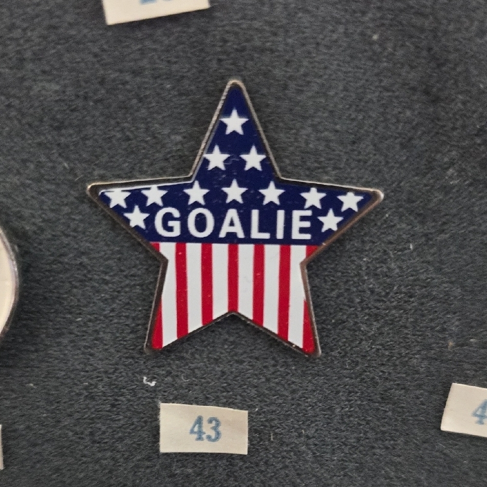 Star-Shaped Goalie Pin with American Flag Design - Picture 1 of 1